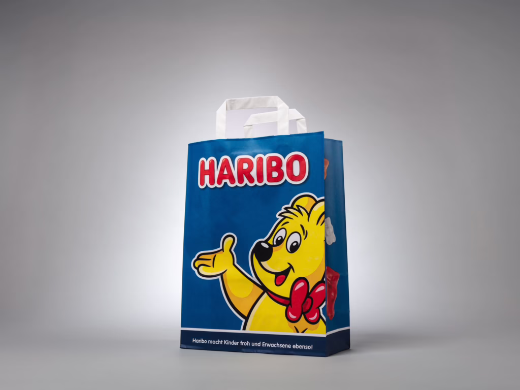 Sacchetto di carta con manici piatti 20 Sacchetto di carta blu con manici piatti per Haribo – stampato da Paolo Sandro