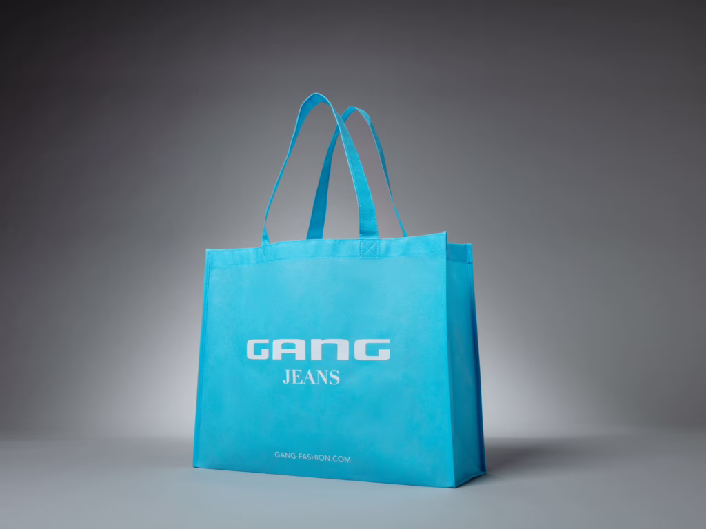 Türkisblaue Non-Woven-Tragetasche für Gang Jeans – bedruckt von Paolo Sandro